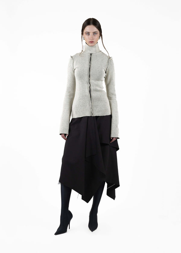 High neck rib knit sweater with raw hems and long sleeves.